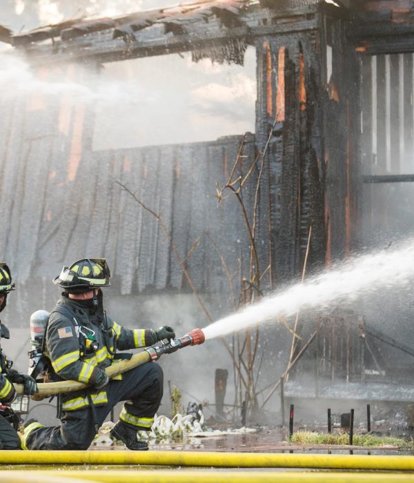 firefighter-sprays-water-on-burning-house-fire-2023-11-27-04-56-39-utc